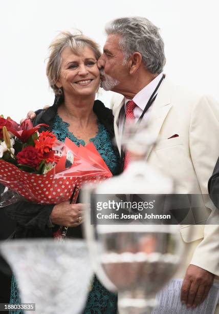 Kypros Kotzikas owner of Master Lavros celebrates with his partner Jane Campbell after winning the Hellers Dominion Trot during New Zealand Dominion...