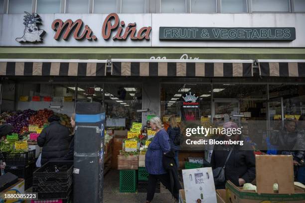 Shoppers at a Mr. Pina Market in the Brooklyn borough of New York, US, on Tuesday, Dec. 26, 2023. The core personal consumption expenditures price...