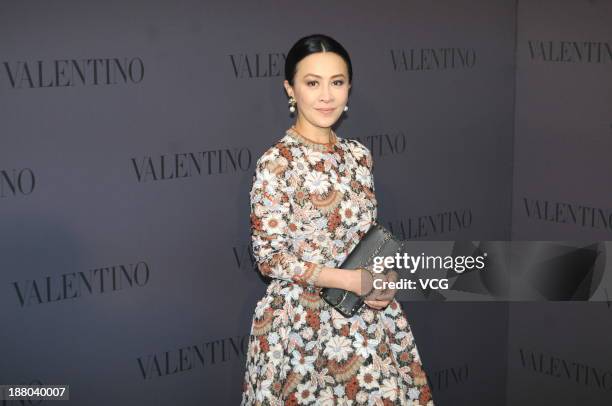 Actress Carina Lau attends Valentino store opening ceremony at IAPM Mall on November 14, 2013 in Shanghai, China.