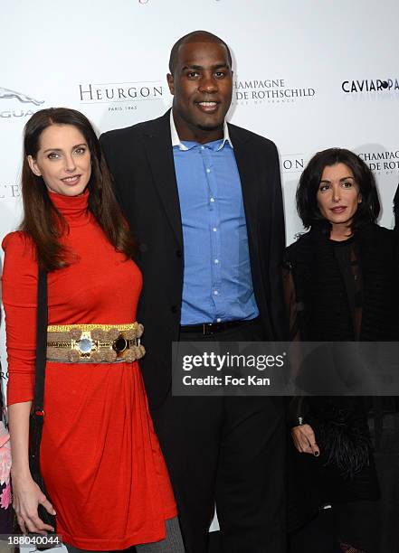 Frederique Bel, Teddy Riner and Marion Bartoli attend the 'Winter Time 2013' : Cocktail at L'Eclaireur Cafe on November 14, 2013 in Paris, France.