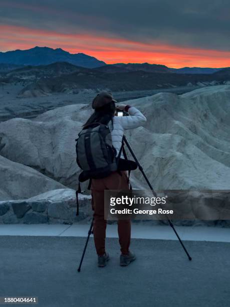 Geological formations and a colorful sunrise at the iconic Zabriskie Point Overlook are viewed on December 15 near Furnace Creek, California. Death...