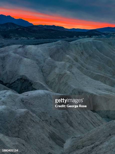 Geological formations and a colorful sunrise at the iconic Zabriskie Point Overlook are viewed on December 15 near Furnace Creek, California. Death...