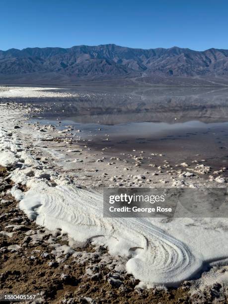 Heavy rain from last August's tropical storm Hilary contributes to the formation of a lake not seen in years at Bad Water Basin on December 15 near...