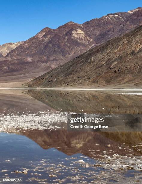 Heavy rain from last August's tropical storm Hilary contributes to the formation of a lake not seen in years at Bad Water Basin on December 15 near...