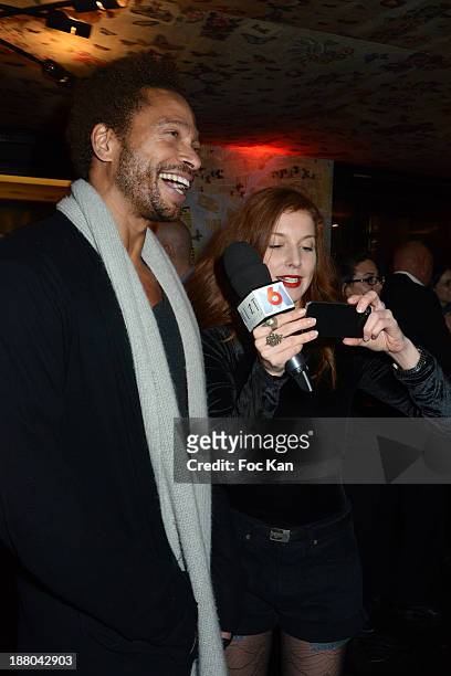 Gary Dourdan and M6 TV journalist Marie Clotilde Ramos Ibanez attend the 'Winter Time 2013' : Cocktail at L'Eclaireur Cafe on November 14, 2013 in...
