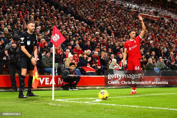Trent Alexander-Arnold of Liverpool prepares to take a corner-kick during the Premier League match between Liverpool FC and Arsenal FC at Anfield on...