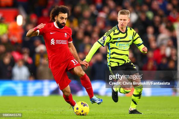 Mohamed Salah of Liverpool in action with Oleksandr Zinchenko of Arsenal during the Premier League match between Liverpool FC and Arsenal FC at...