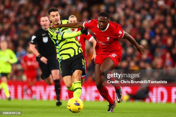 Ibrahima Konate of Liverpool in action with Gabriel Martinelli of Arsenal during the Premier League match between Liverpool FC and Arsenal FC at...