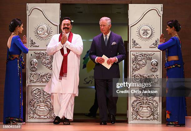 President Mahinda Rajapaksa of Sri Lanka and Prince Charles, Prince of Wales walk onto stage during the Commonwealth Heads of Government 2013 Opening...