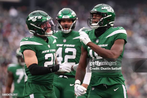 Irvin Charles of the New York Jets celebrates a tackle during the third quarter against the Washington Commanders at MetLife Stadium on December 24,...