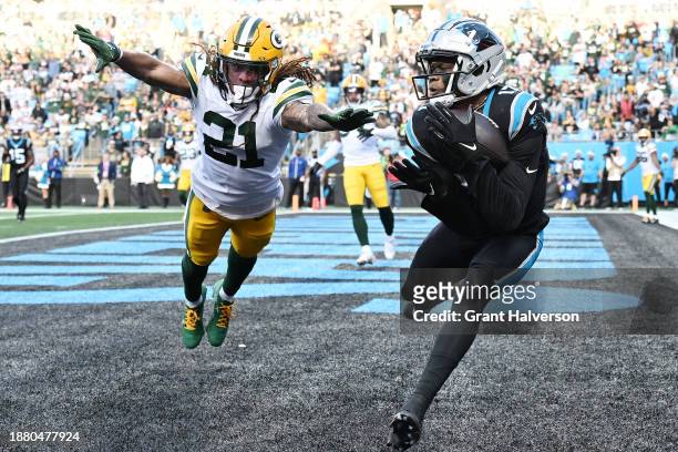 Chark Jr. #17 of the Carolina Panthers scores a touchdown during the fourth quarter against Eric Stokes of the Green Bay Packers at Bank of America...