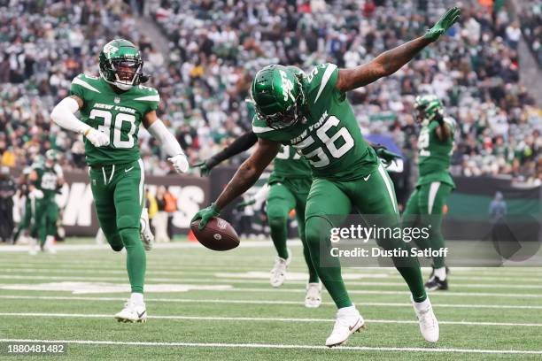 Quincy Williams of the New York Jets celebrates an interception during the third quarter against the Washington Commanders at MetLife Stadium on...