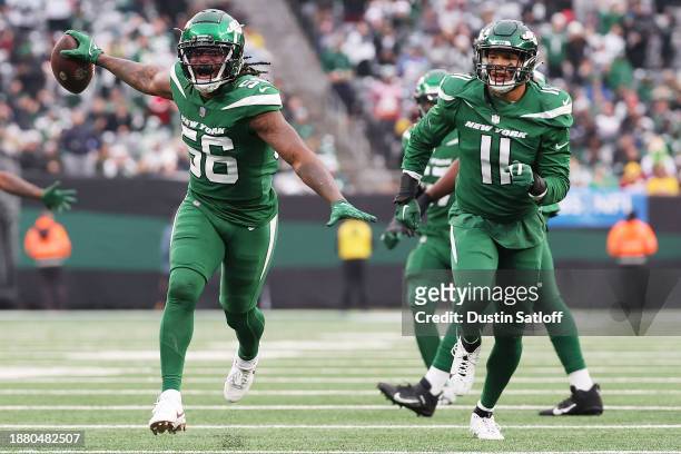 Quincy Williams of the New York Jets celebrates an interception during the third quarter against the Washington Commanders at MetLife Stadium on...