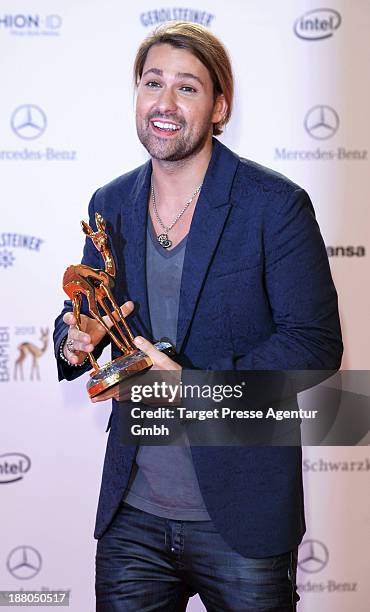 David Garrett poses with the Bambi for Classic at Stage Theater on November 14, 2013 in Berlin, Germany.