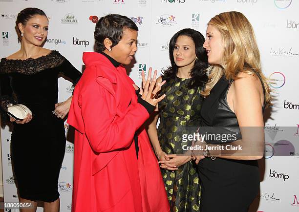 Erica Reid, Hilaria Baldwin and Daphne Oz attends and evening celebrating the expansion of healthcare services to women worldwide on November 14,...