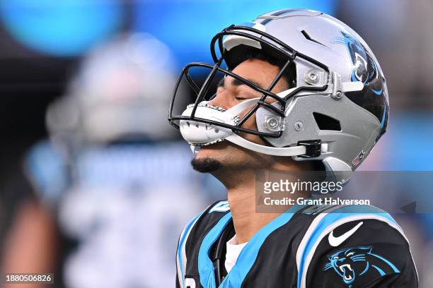 Bryce Young of the Carolina Panthers reacts to running out of time to make a play before the end of the game against the Green Bay Packers at Bank of...