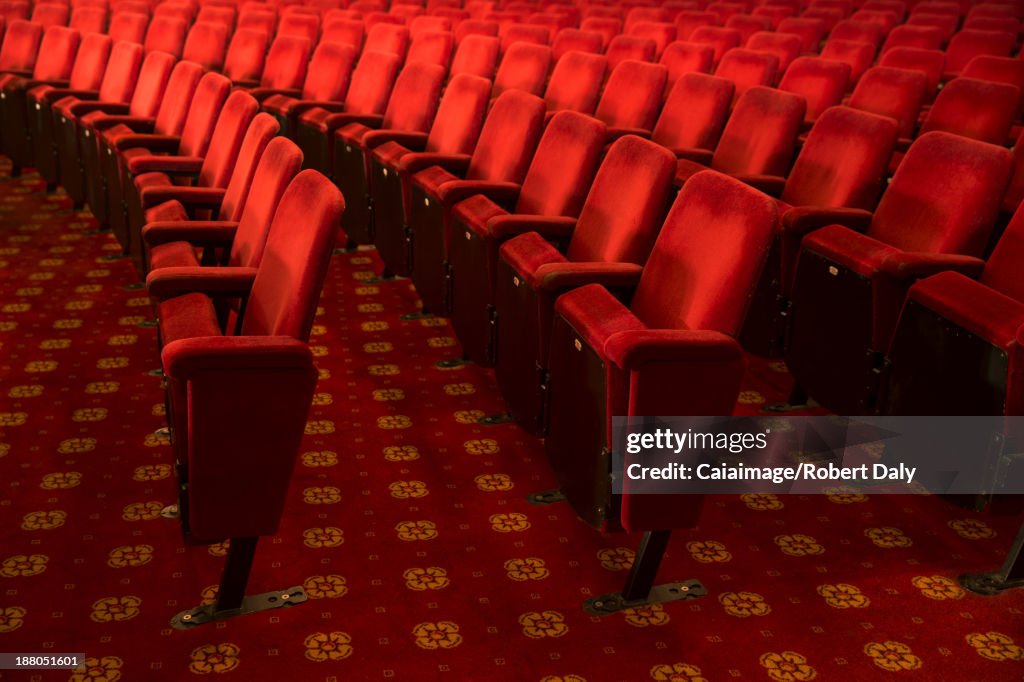 Seats in empty theater auditorium