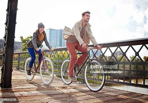 urban cyclists - denver stock pictures, royalty-free photos & images