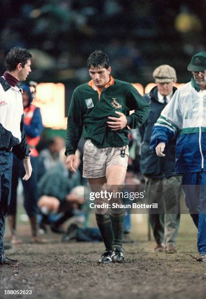 South African rugby player Joost van der Westhuizen leaves the pitch with broken ribs during a pool stage match against France in the Rugby World Cup...