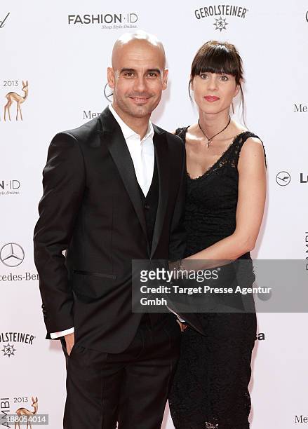 Josep Guardiola and his wife Cristina Serra attend the Bambi Award 2013 at Stage Theater on November 14, 2013 in Berlin, Germany.