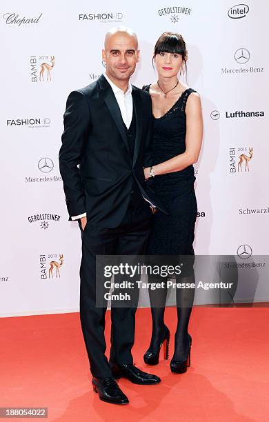 Josep Guardiola and his wife Cristina Serra attend the Bambi Award 2013 at Stage Theater on November 14, 2013 in Berlin, Germany.