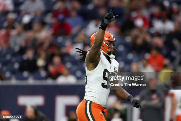 Za'Darius Smith of the Cleveland Browns celebrates a sack against the Houston Texans during the third quarter at NRG Stadium on December 24, 2023 in...