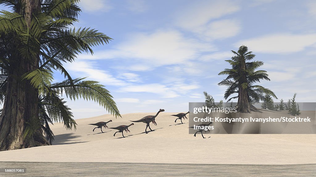 Herd of Gigantoraptors walking along the shore.