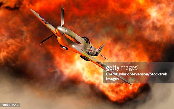 a british supermarine spitfire bursting through the explosive flames of its recent kill. - dogfight stock illustrations