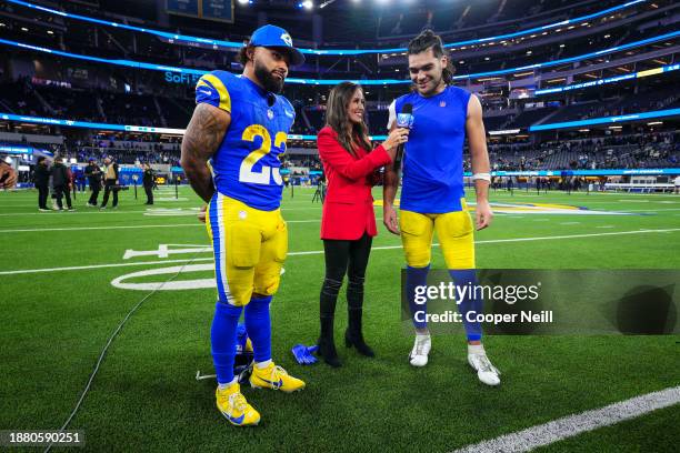 Kyren Williams of the Los Angeles Rams and wide receiver Puka Nacua are interviewed by Kaylee Hartung after an NFL football game between the New...