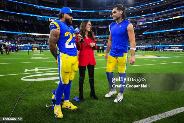 Kyren Williams of the Los Angeles Rams and wide receiver Puka Nacua are interviewed by Kaylee Hartung after an NFL football game between the New...