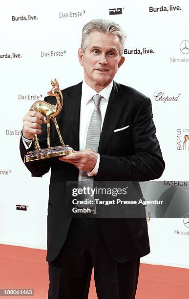 Jupp Heynckes poses with the Bambi for sport at Stage Theater on November 14, 2013 in Berlin, Germany.