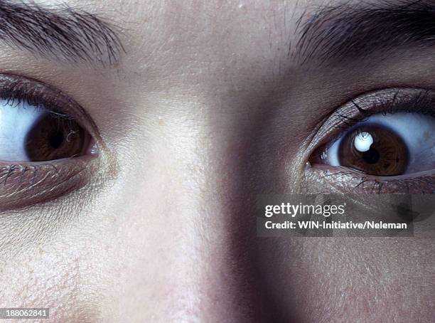 close up of a cross-eyed woman - cross eyed stock pictures, royalty-free photos & images