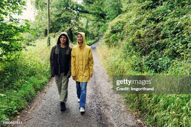 teenagers hiking in the cotswolds, gloucestershire, united kingdom - brother with two sisters stock pictures, royalty-free photos & images