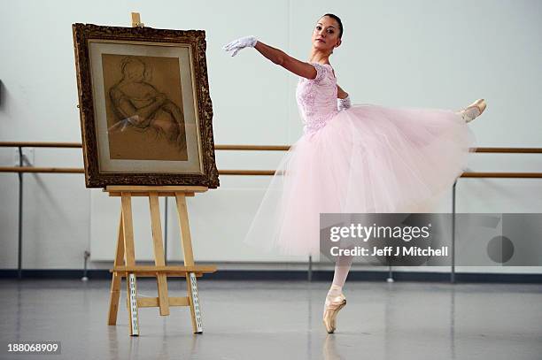 Luciana Ravizzi, in her dream dress from Scottish Ballet’s forthcoming premiere of Hansel & Gretel, stands next to a sketch of a ballerina by Edgar...