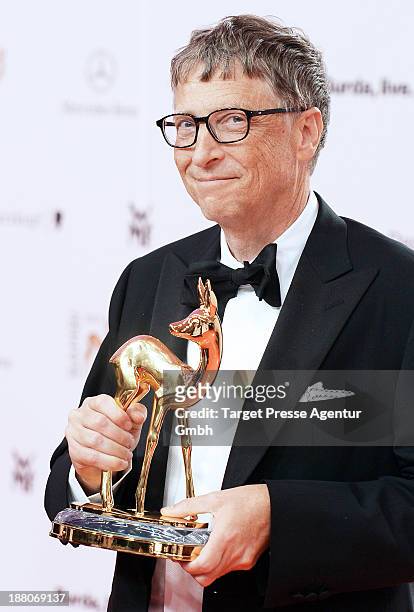 Bill Gates poses with the Millenium Bambi at Stage Theater on November 14, 2013 in Berlin, Germany.