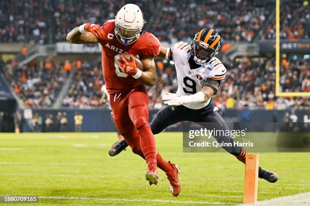 James Conner of the Arizona Cardinals scores a touchdown during the second quarter against the Chicago Bears at Soldier Field on December 24, 2023 in...