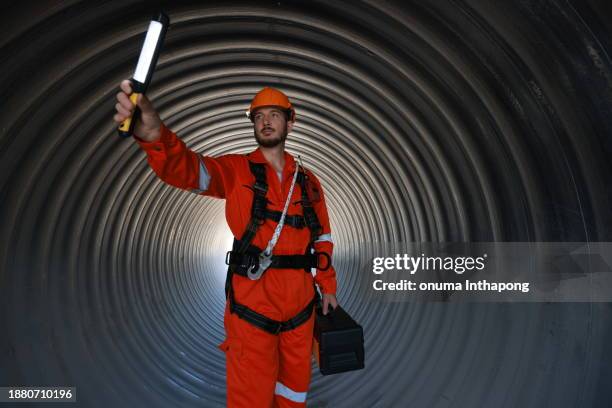 Flashlight Using Contuction Worker Broken Pipeline Photos and Premium High Res Pictures - Getty Images
