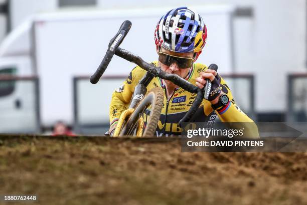 Belgian Wout van Aert pictured in action during the men elite race at the cyclocross cycling event in Heusden-Zolder, the stage 6/8 in the...