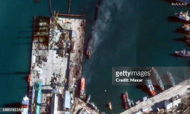 Maxar 'AFTER" satellite imagery of the reported attack on a Russian Ropucha-class landing ship at the eastern Crimean port of Feodosia. The remains...