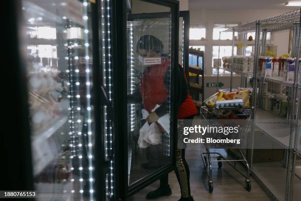 Guest shops for groceries at the Neighbor to Neighbor food pantry in Greenwich, Connecticut, US, on Monday, Nov. 20, 2023. Neighbor to Neighbor is...