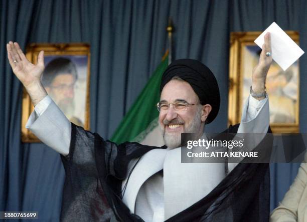 Iranian President Mohammad Khatami acknowledges the crowd at a rally in Shahriar, 35km southwest of Tehran, 25 June 2003. Iran's reformist-controlled...