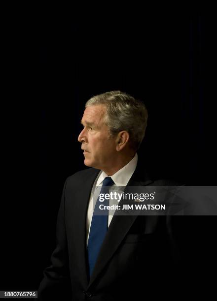 President George W. Bush arrives at the Eisenhower Executive Office Building in Washington, DC, June 2, 2008 to participate in a meeting on the...