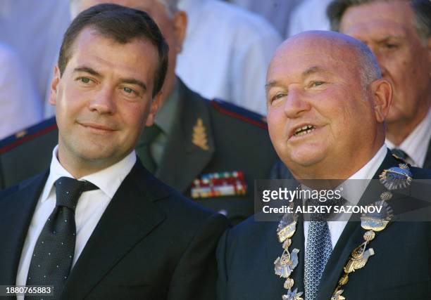 Russian President Dmitry Medvedev speaks with Moscow Mayor Yuri Luzhkov in Moscow on September 7 the day on which Moscow celebrated "City Day." The...