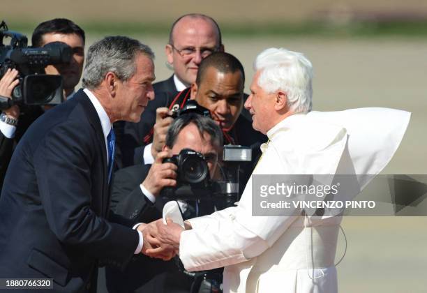 President George W. Bush greets Pope Benedict XVI upon his arrival at Andrews Air Force Base April 15, 2008 in Maryland. Pope Benedict begins a...