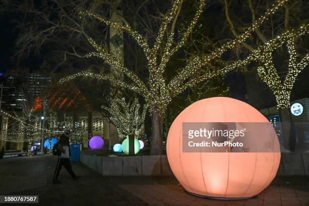 Edmonton's Town Hall on Churchill Square hosts an unconventional light exhibition headlined by the interactive 'moonGARDEN' display, skipping the...