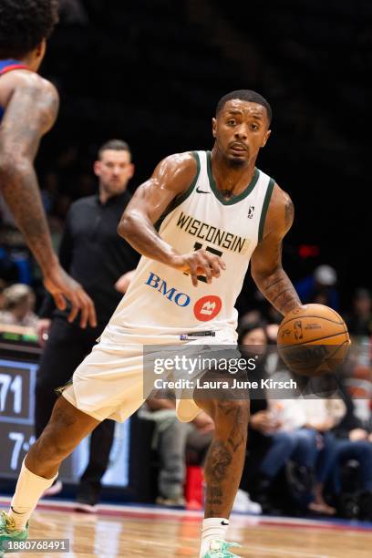 Elijah Hughes of the Wisconsin Herd handles the ball during the game against the Long Island Nets on December 27, 2023 at Nassau Coliseum in...