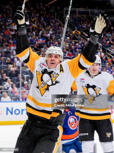 Evgeni Malkin of the Pittsburgh Penguins celebrates after scoring a goal against the New York Islanders during the second period at UBS Arena on...