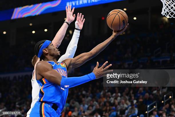 Shai Gilgeous-Alexander of the Oklahoma City Thunder goes up for a layup during the first half against the New York Knicks at Paycom Center on...