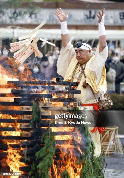 Year-end "otakiage" ritual, in which monks throw charms and amulets onto a temple fire in appreciation for the granting of worshippers' wishes, is...