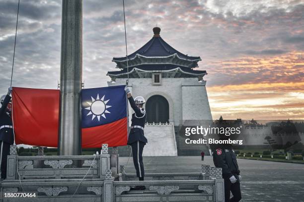 An honor guard during a flag raising ceremony at Chiang Kai Shek Memorial Hall in Taipei, Taiwan, on Wednesday, Dec. 27, 2023. Next month Taiwan...